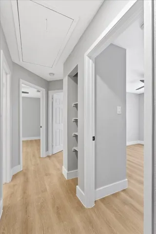 a view of entryway with wooden floor