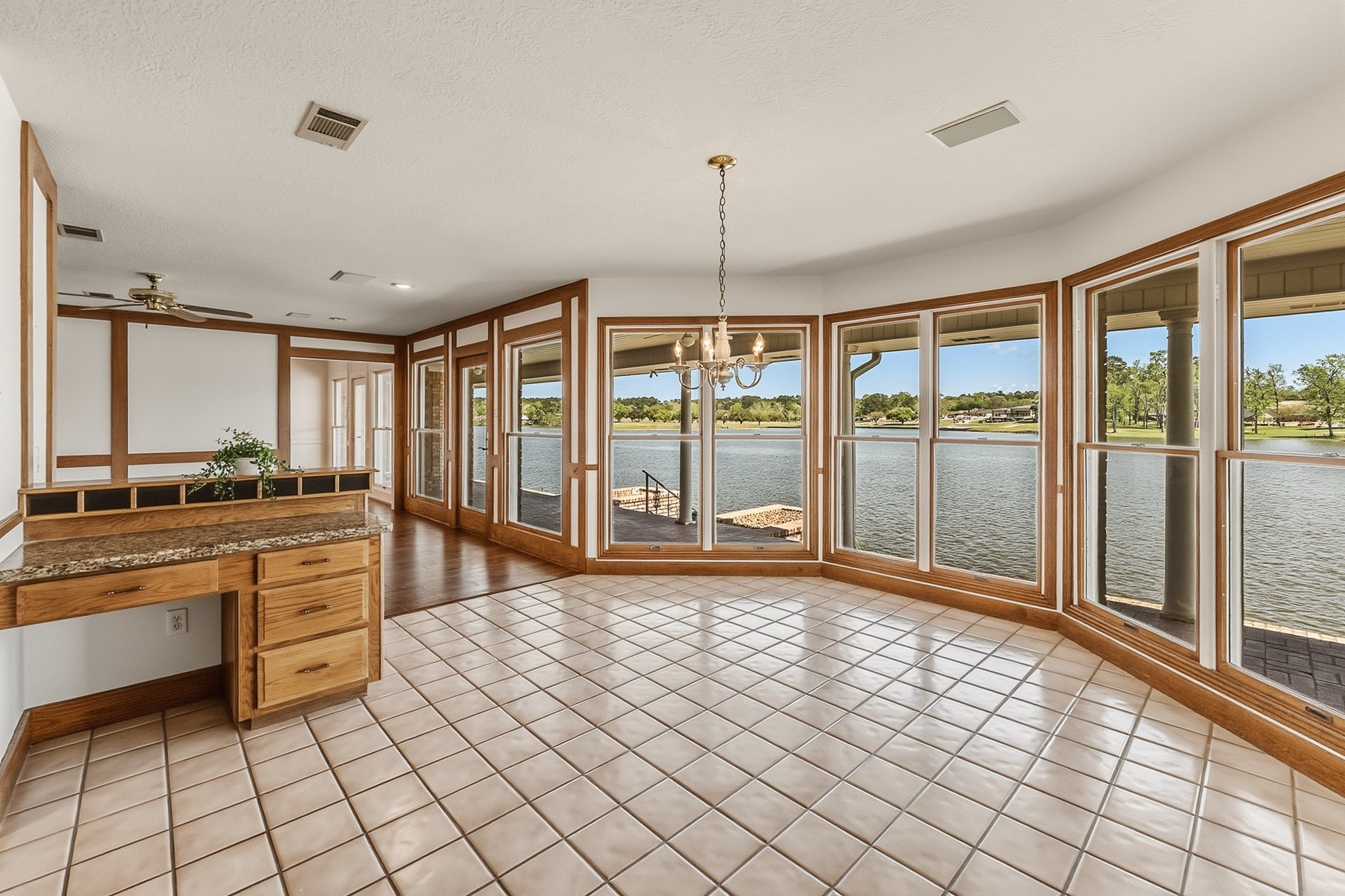 2008 Wickersham Drive Huntsville, TX 77340 - Photo 2 of 44 Views of the lake from every room at the back of the home.