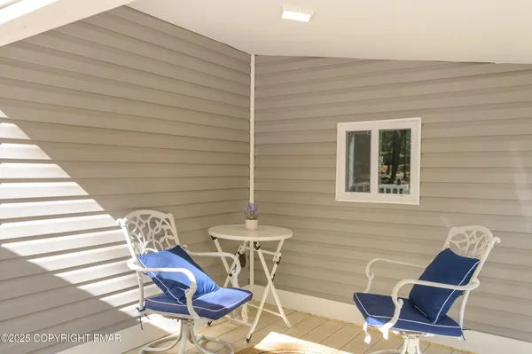 a view of a room that has a window