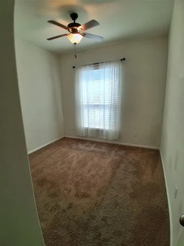 a view of kitchen and natural light