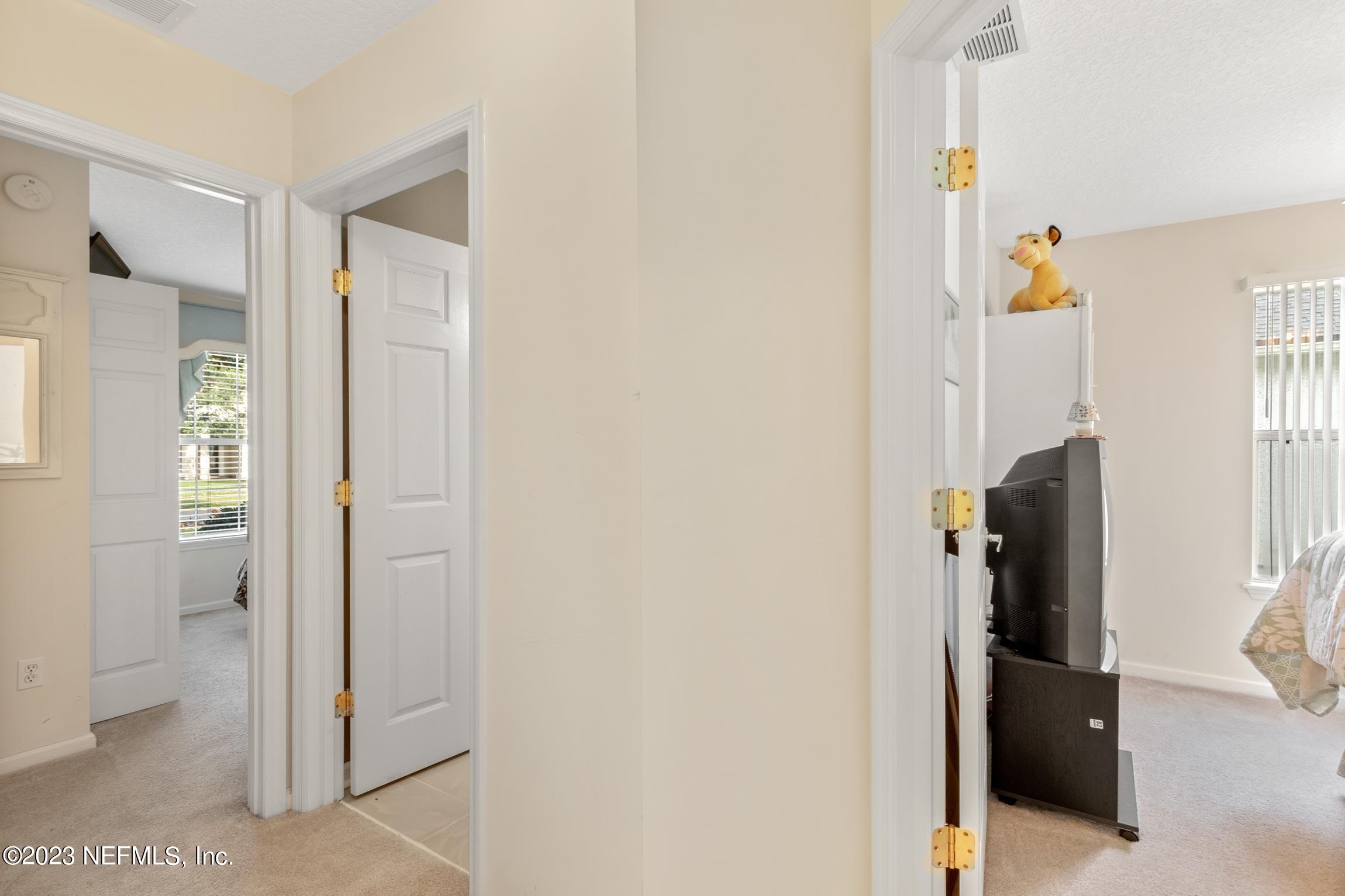 1796 Keswick Road St. Augustine, FL 32084 - Photo 24 of 48 a view of hallway with livingroom and furniture