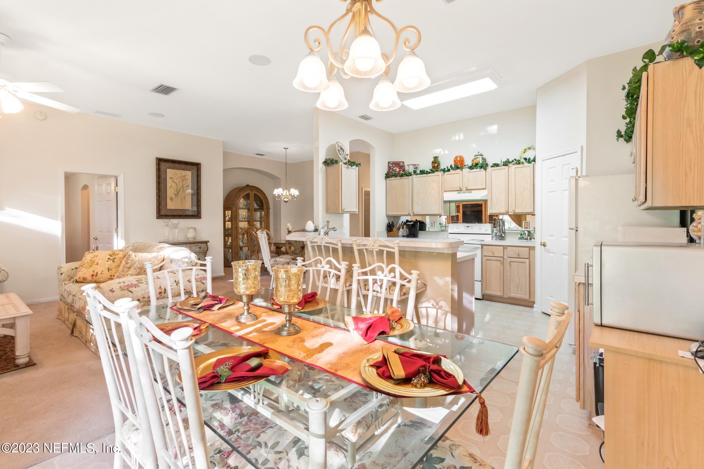 1796 Keswick Road St. Augustine, FL 32084 - Photo 8 of 48 a view of a dining room with furniture