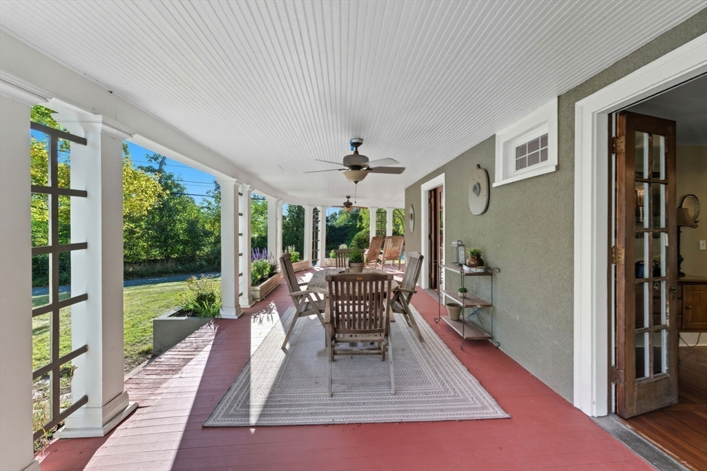 57 Upper Gore Road Webster, MA 01570 - Photo 39 of 42 a living room with furniture and a large window
