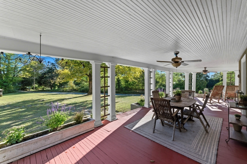 57 Upper Gore Road Webster, MA 01570 - Photo 40 of 42 a view of a dining room with furniture window and outside view