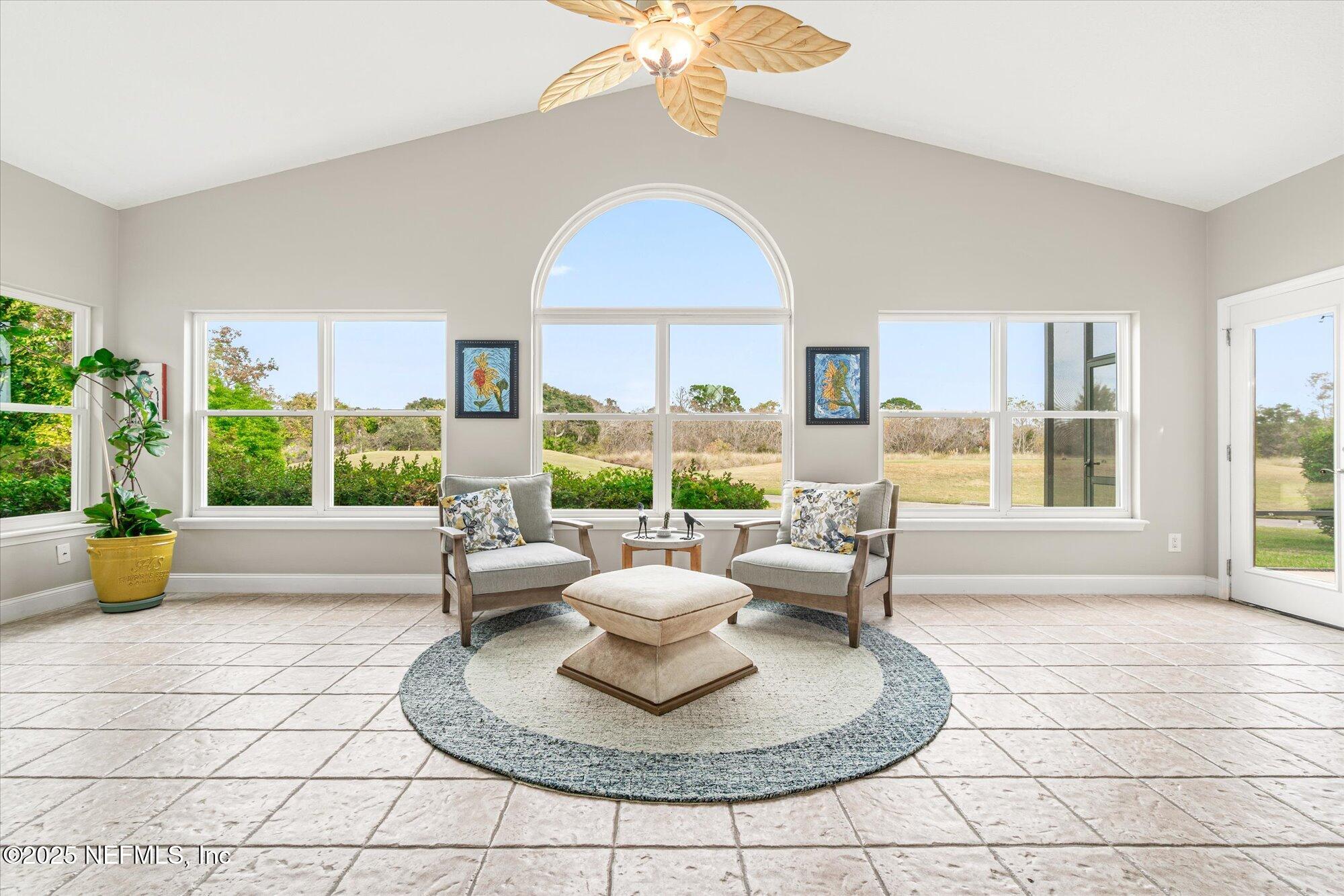 606 Teeside Court St. Augustine, FL 32080 - Photo 17 of 47 a living room with furniture and a large window