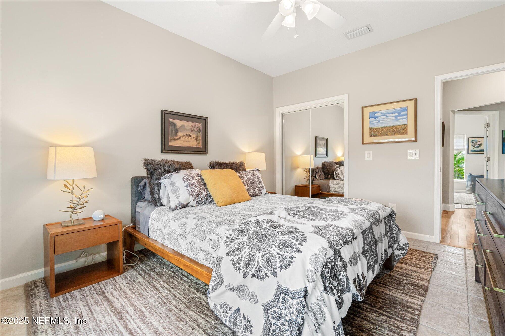 606 Teeside Court St. Augustine, FL 32080 - Photo 30 of 47 a bedroom with bed and a window