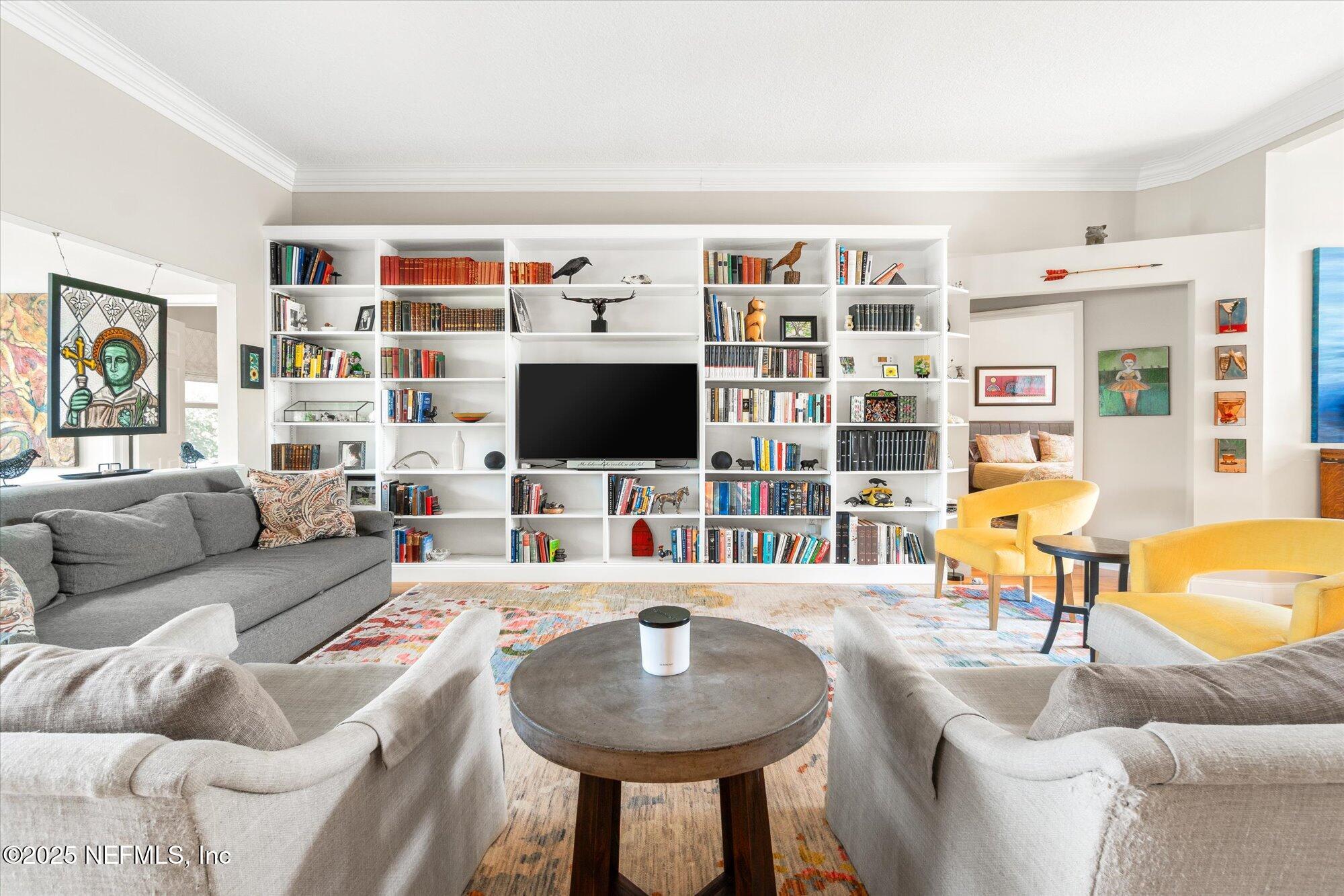 606 Teeside Court St. Augustine, FL 32080 - Photo 6 of 47 a living room with furniture and a flat screen tv