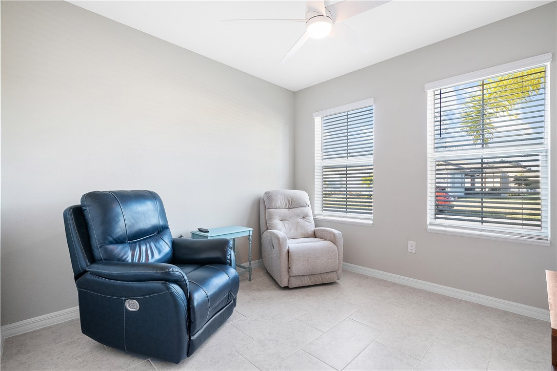 6187 Red Maple Manor Vero Beach, FL 32966 - Photo 21 of 31 a living room with furniture and a window
