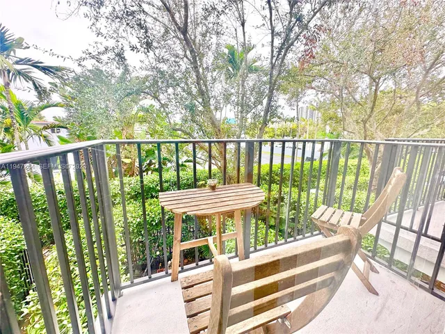 a view of a two chairs in the deck