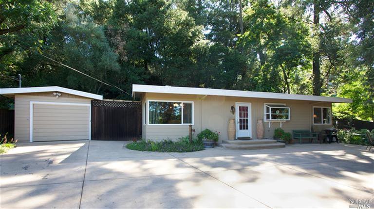 815 Dry Creek Road Healdsburg, CA 95448 - Photo 1 of 1 a view of a house with backyard and a garden