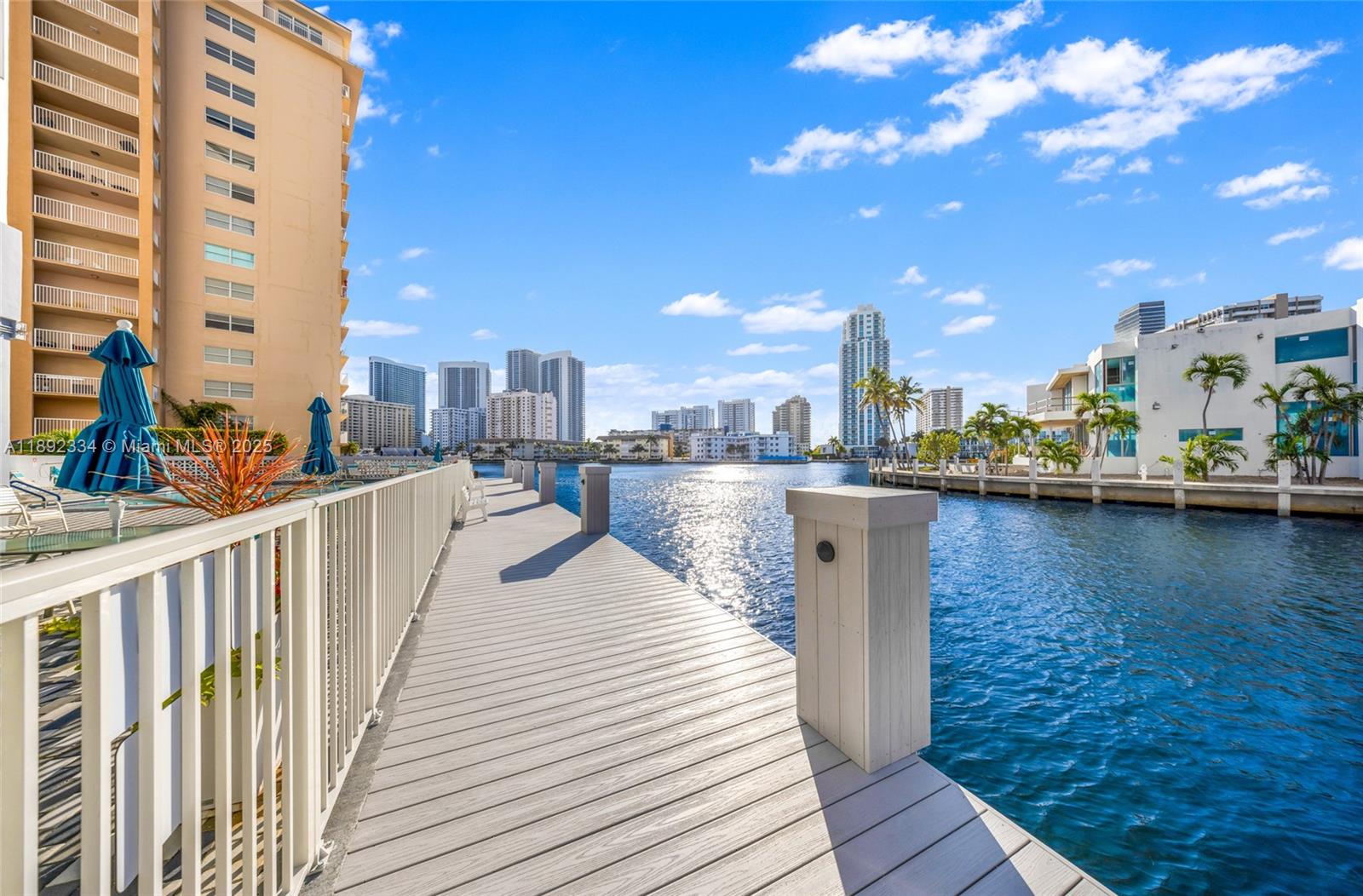 137 Golden Isles Drive, Unit 508 Hallandale Beach, FL 33009 - Photo 19 of 24 a view of a lake and outdoor space