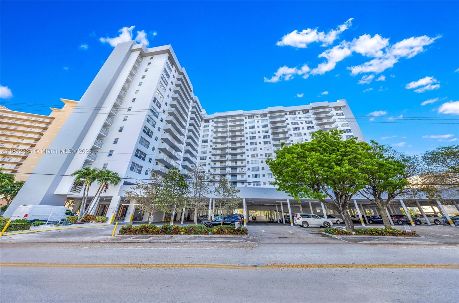137 Golden Isles Drive, Unit 508 Hallandale Beach, FL 33009 - Photo 21 of 24 a view of a tall building