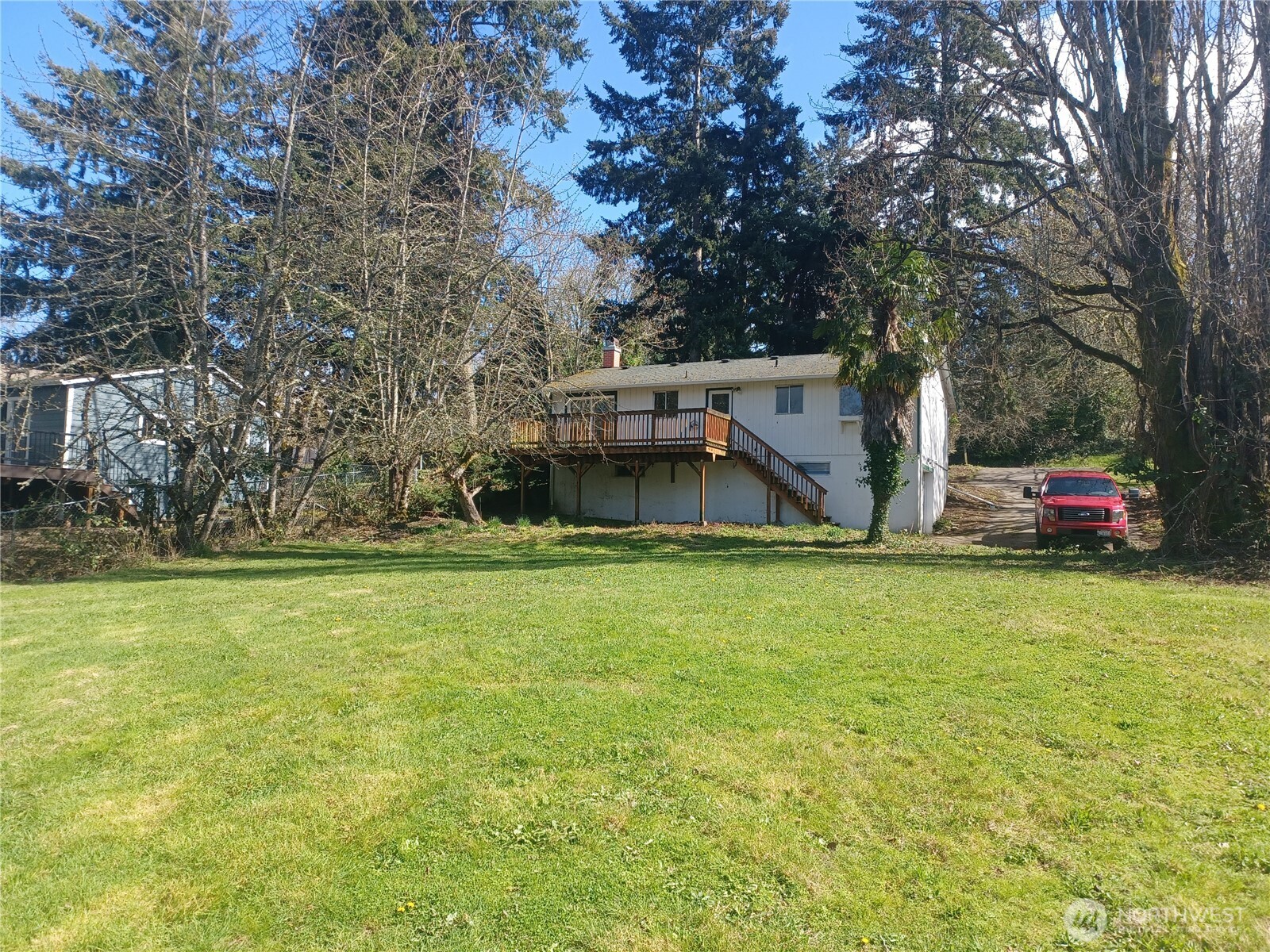 714 Union Avenue Steilacoom, WA 98388 - Photo 2 of 16 a house with trees in front of it