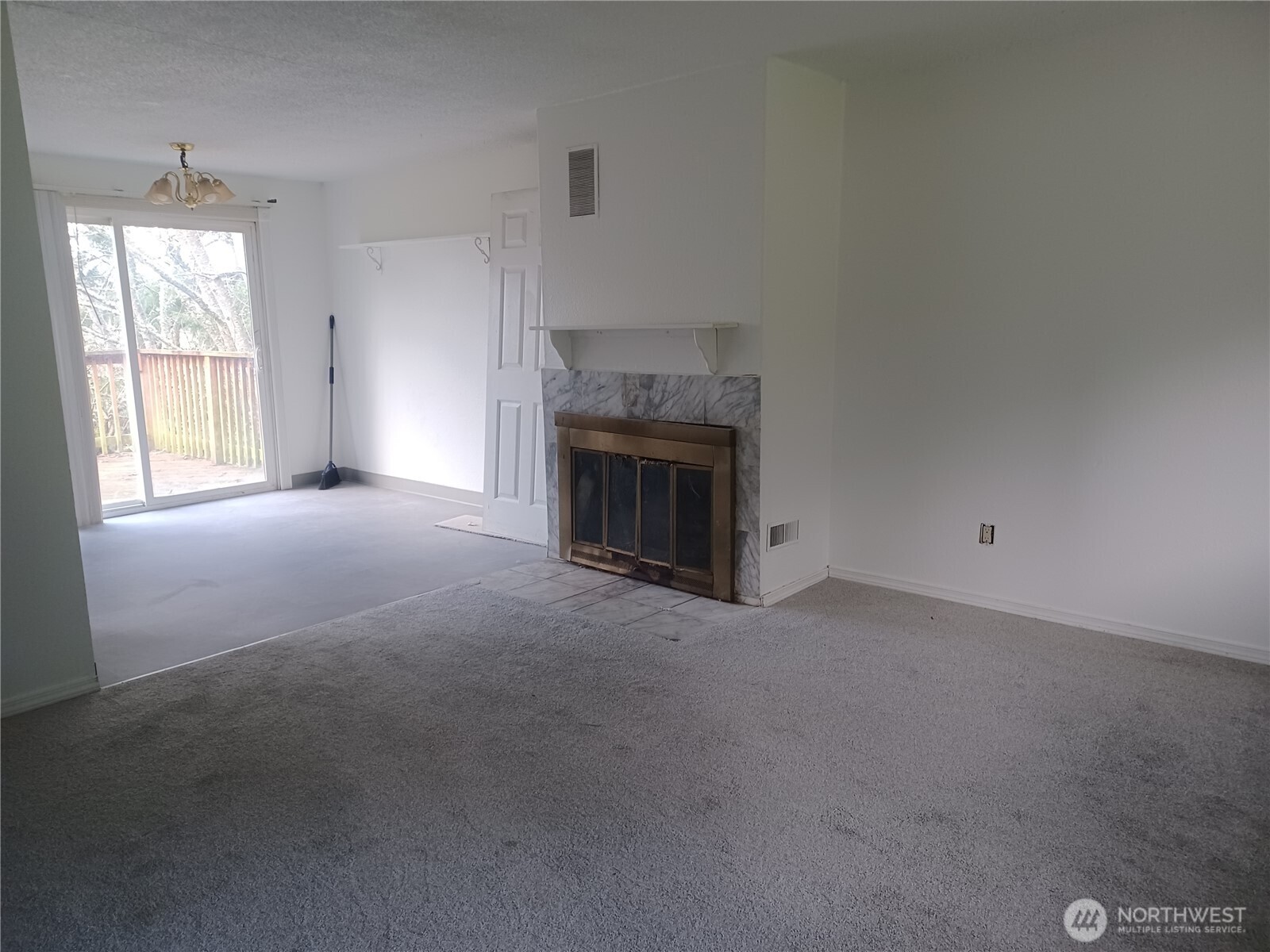 714 Union Avenue Steilacoom, WA 98388 - Photo 5 of 16 a view of empty room with a fireplace