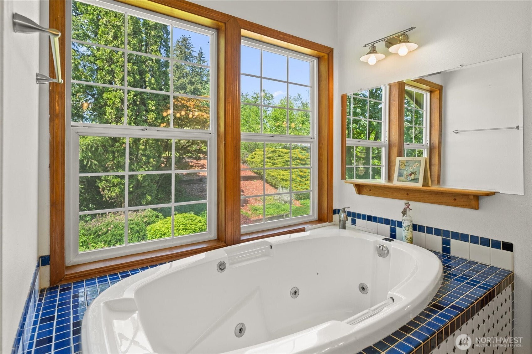 672 Walker Road Kelso, WA 98626 - Photo 17 of 40 a white bath tub sitting in front of a window