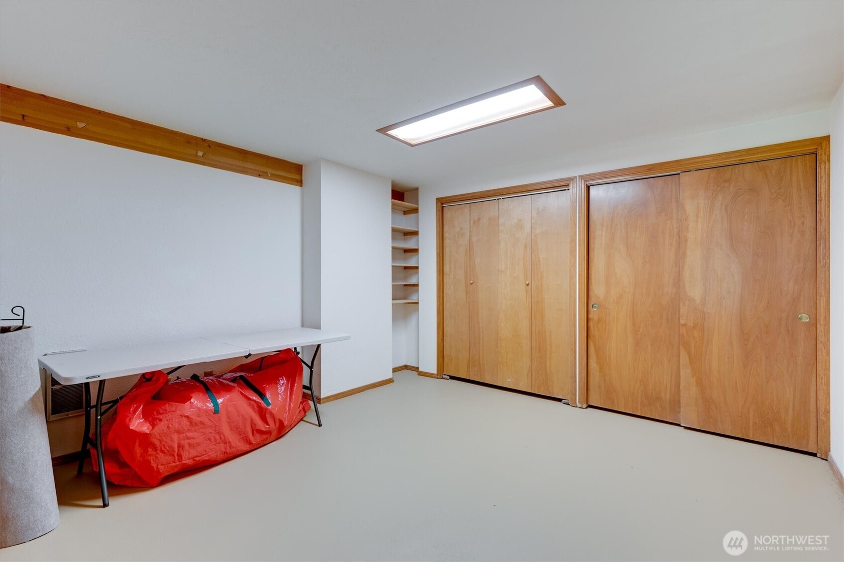 672 Walker Road Kelso, WA 98626 - Photo 22 of 40 a view of a room with wooden floor and closet