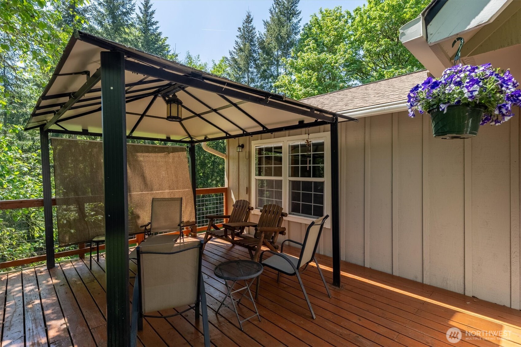 672 Walker Road Kelso, WA 98626 - Photo 24 of 40 a patio with wooden table and chairs