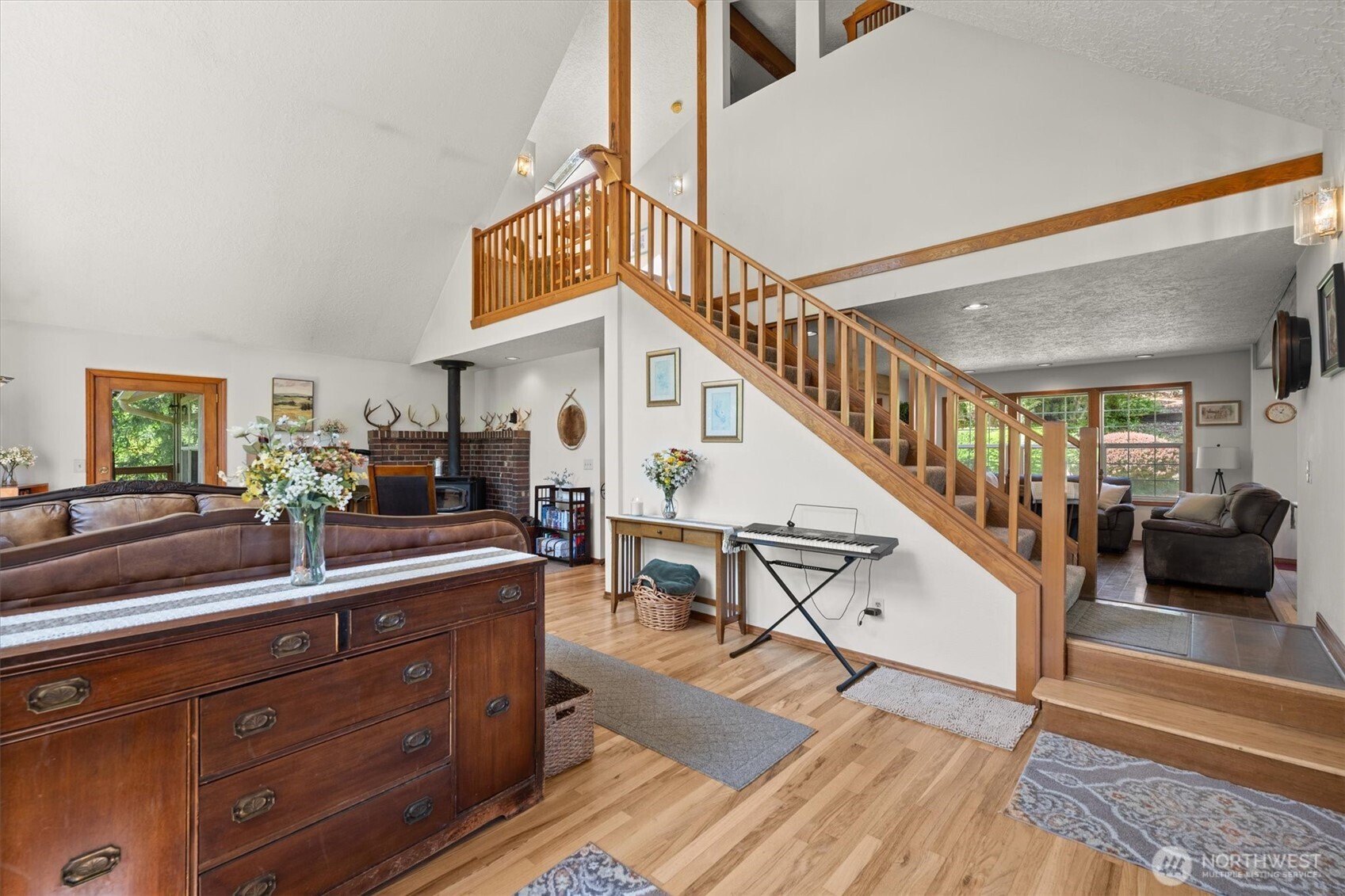 672 Walker Road Kelso, WA 98626 - Photo 8 of 40 a view of living room and entryway with wooden floor