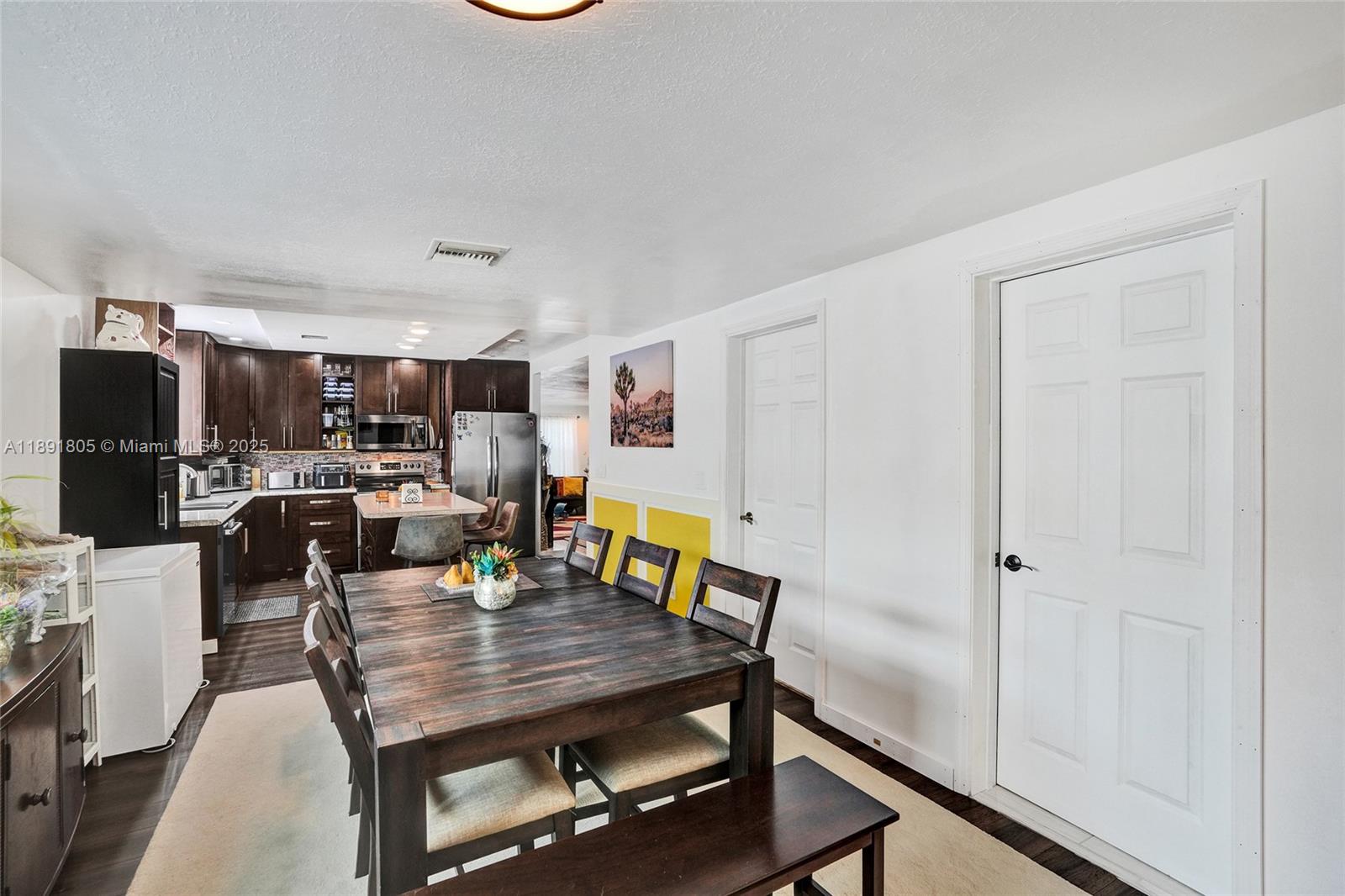 11201 Southwest 55th Street Miramar, FL 33025 - Photo 20 of 38 a view of a dining room with furniture