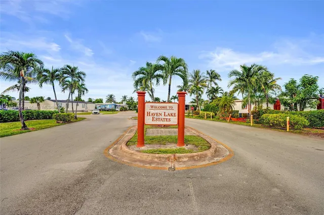 a view of a park with palm trees