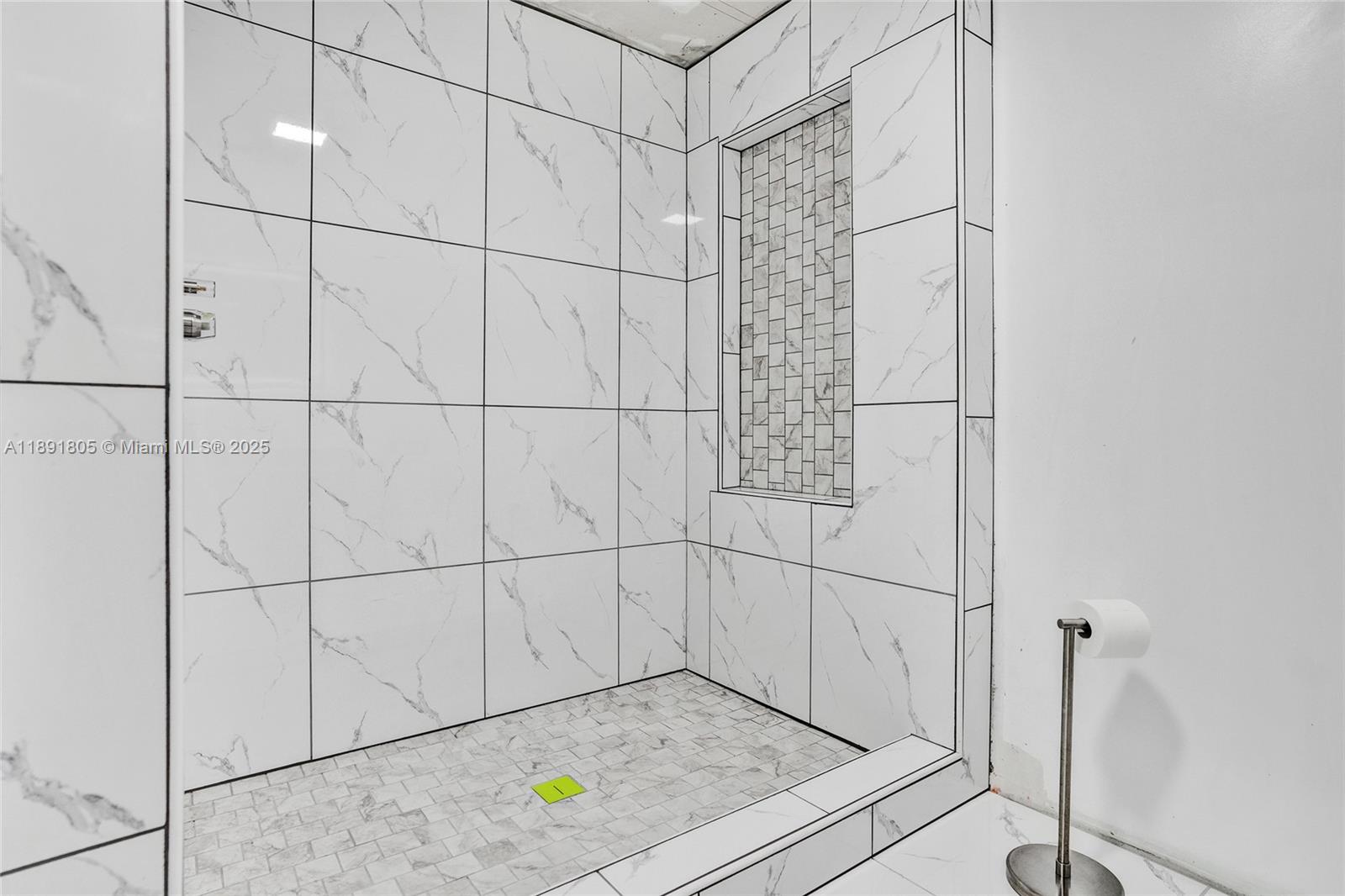 11201 Southwest 55th Street Miramar, FL 33025 - Photo 36 of 38 a bathroom with a shower
