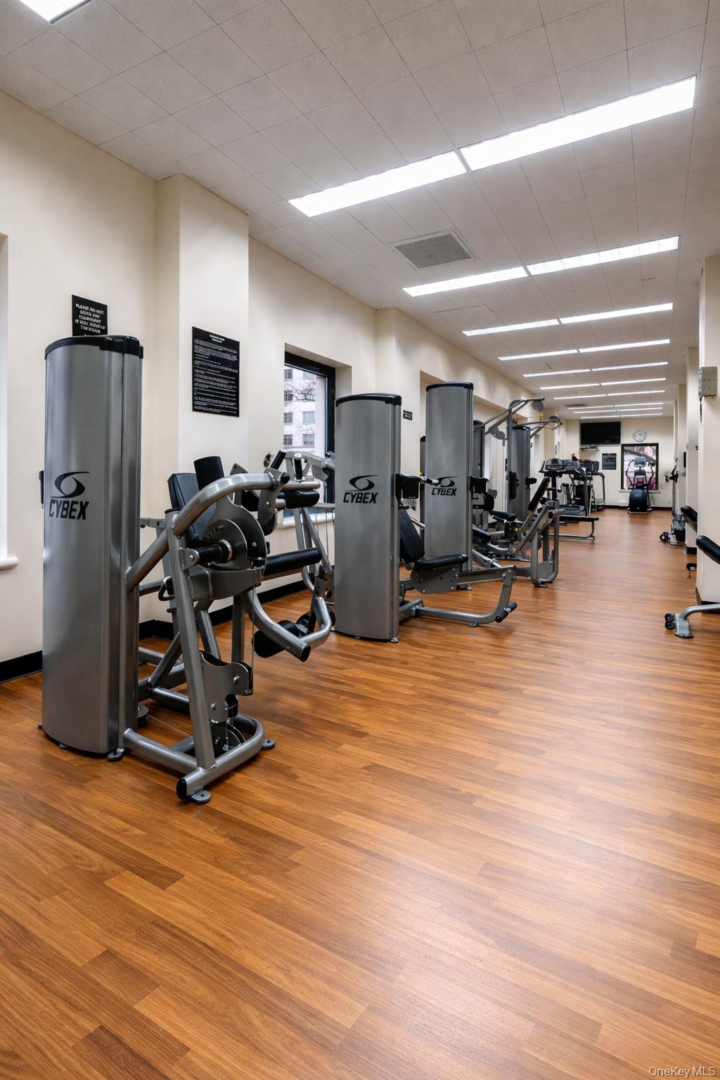 188 East 70th Street, Unit 8B Manhattan, NY 10021 - Photo 9 of 12 a view of a room with gym equipment
