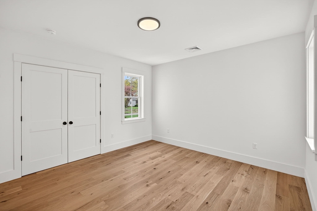 132 Great Western Road Harwich, MA 02645 - Photo 32 of 42 a view of a room with wooden floor and windows