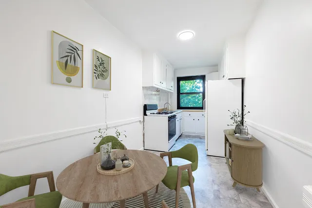 a view of a kitchen with a sink