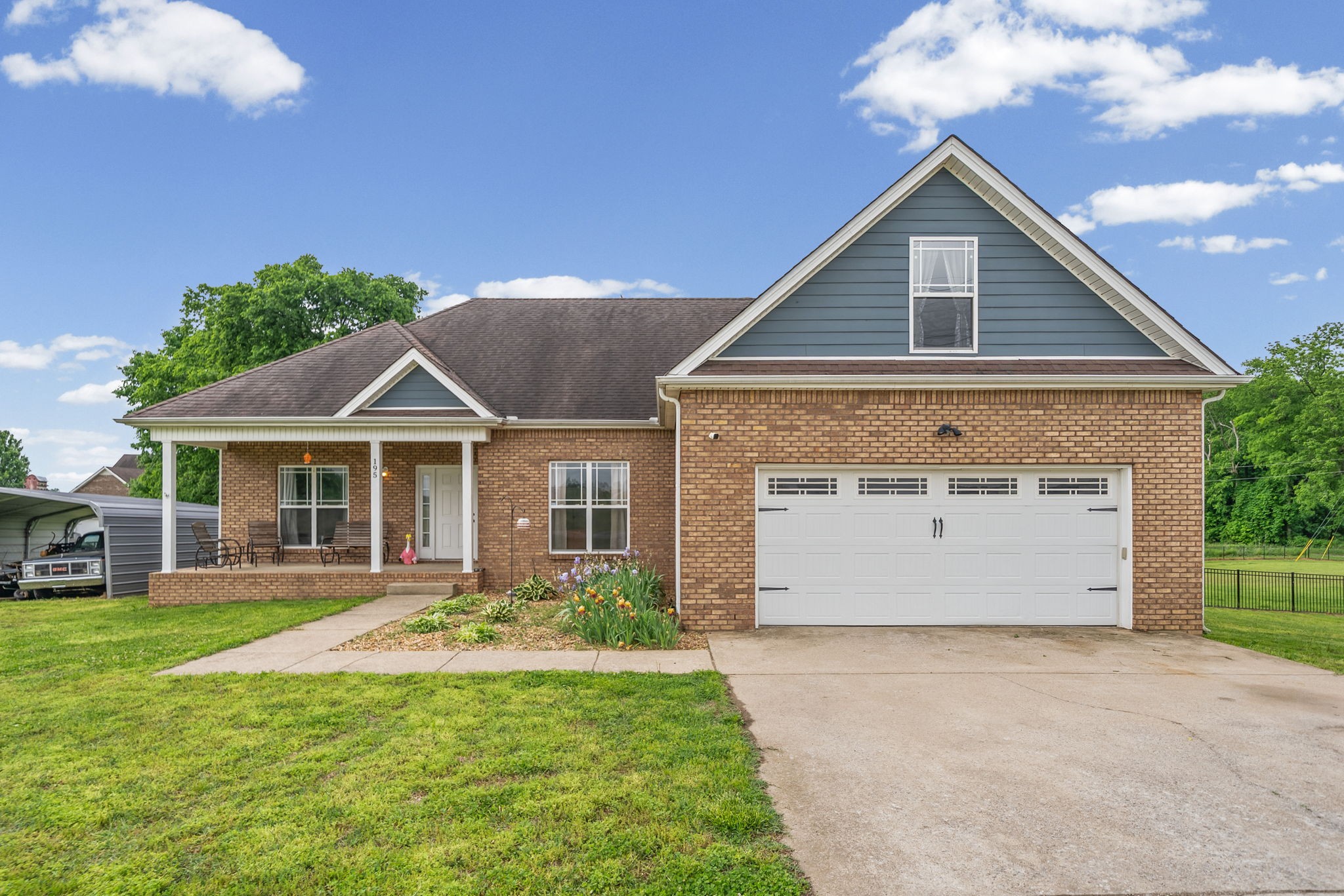195 Barkers Mill Road Pembroke, KY 42266 - Photo 1 of 39 a front view of a house with a yard