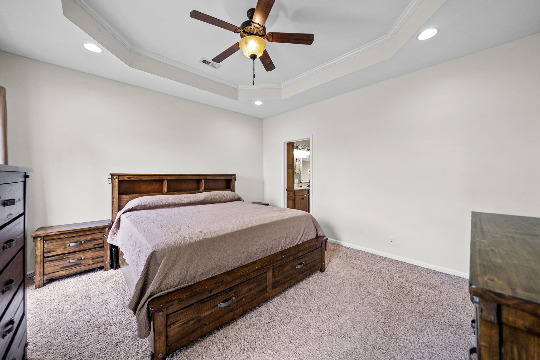 195 Barkers Mill Road Pembroke, KY 42266 - Photo 14 of 39 a bedroom with a bed and a ceiling fan