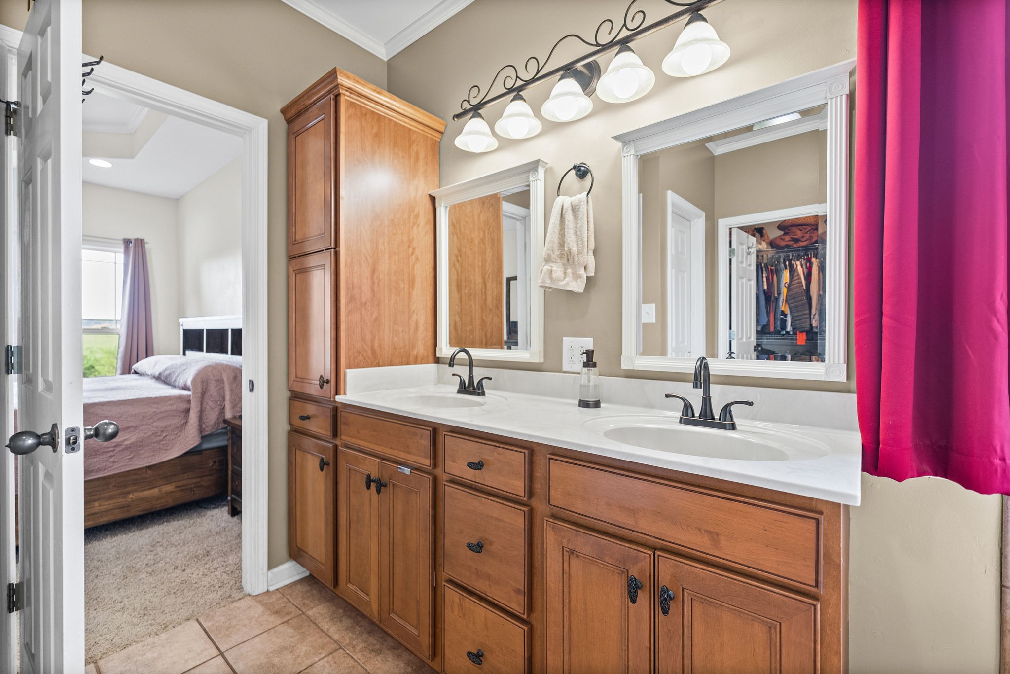 195 Barkers Mill Road Pembroke, KY 42266 - Photo 16 of 39 a en suite bathroom with a double vanity sink and a mirror