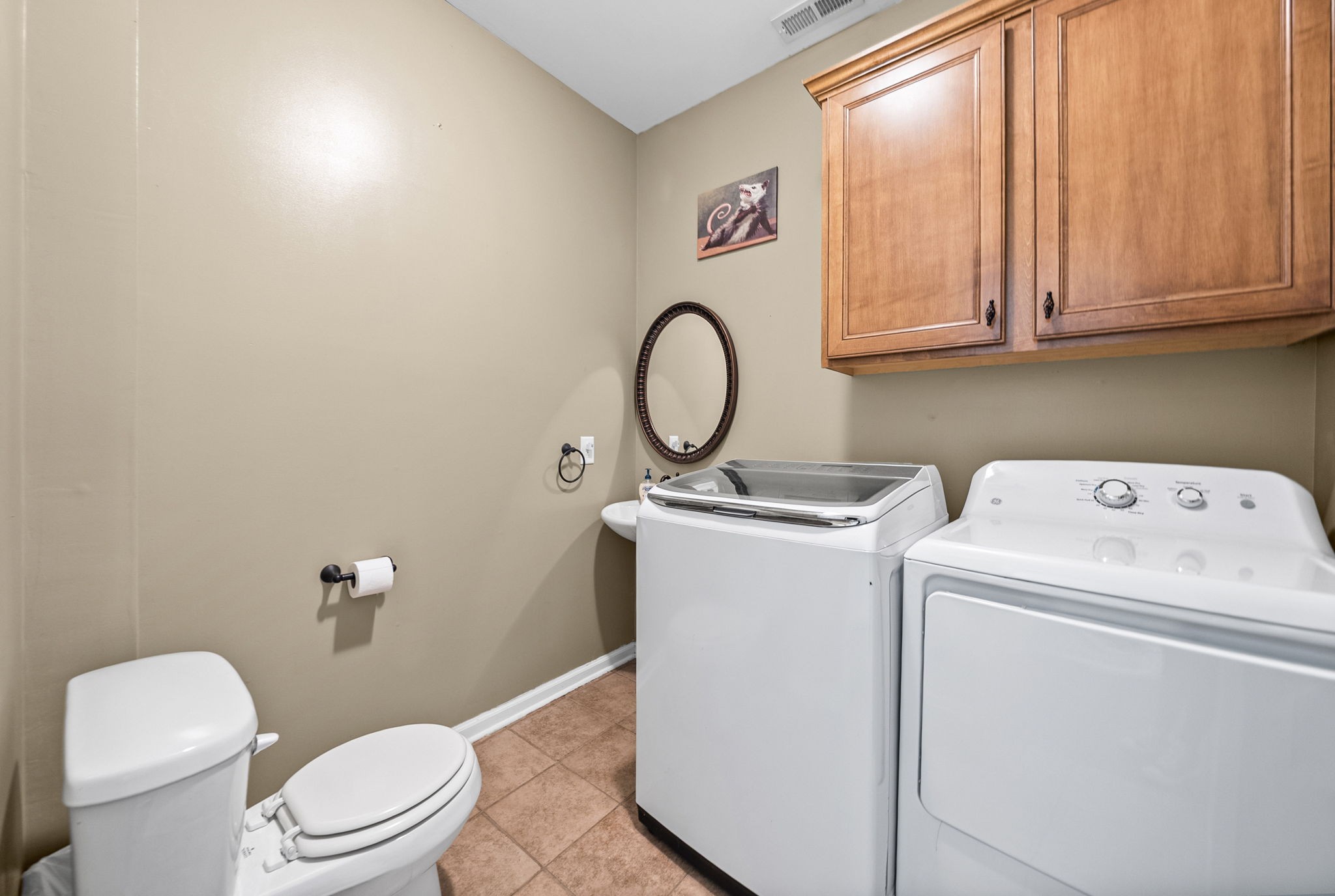 195 Barkers Mill Road Pembroke, KY 42266 - Photo 24 of 39 a bathroom with a toilet sink and mirror
