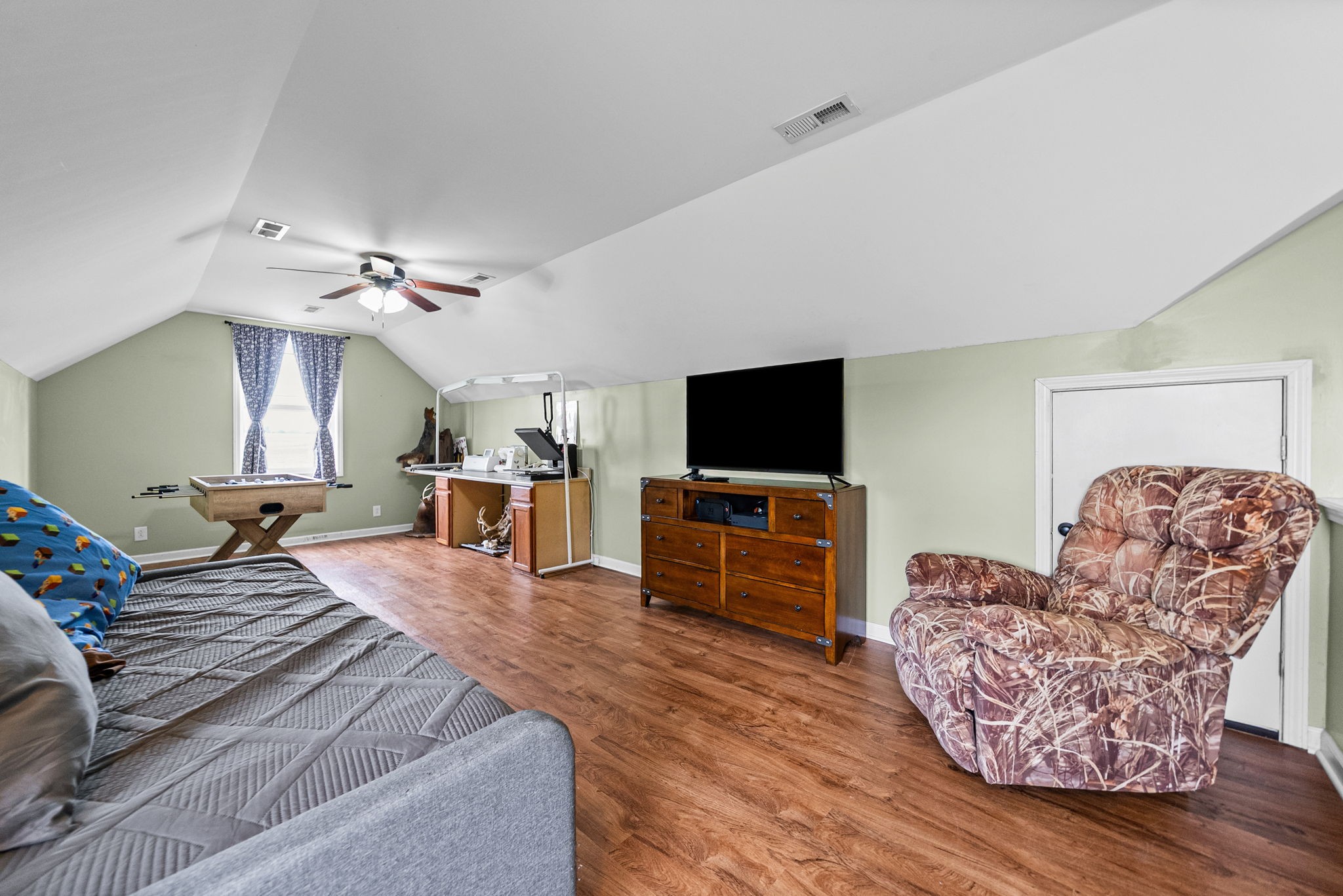 195 Barkers Mill Road Pembroke, KY 42266 - Photo 26 of 39 a living room with furniture and a flat screen tv