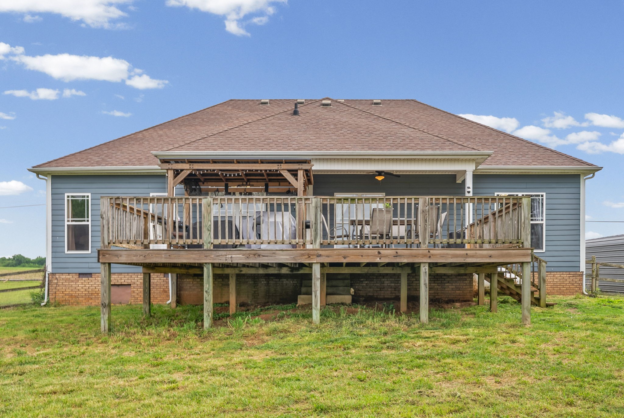 195 Barkers Mill Road Pembroke, KY 42266 - Photo 35 of 39 a backyard of a house with table and chairs