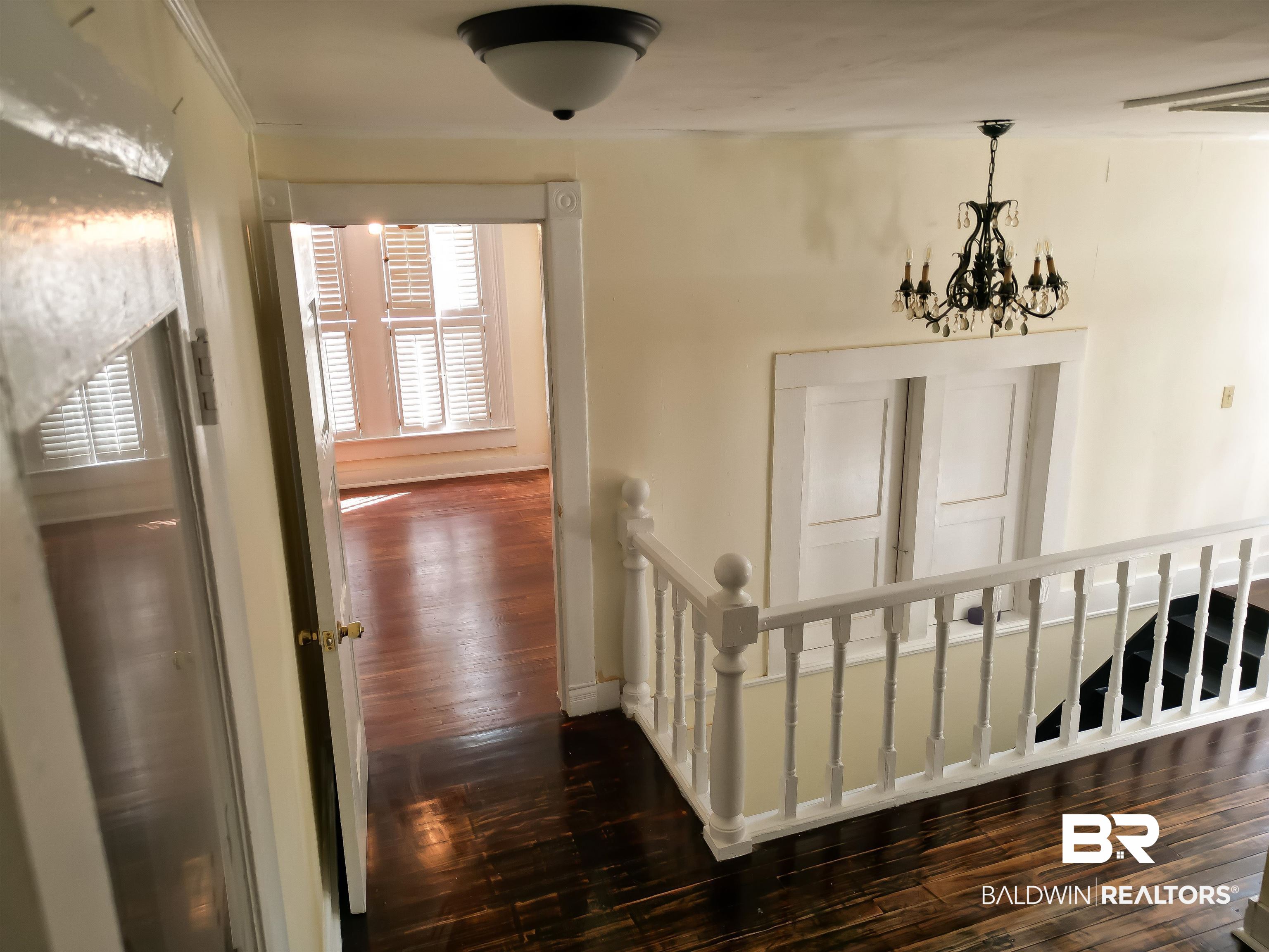 73 Liberty Street Monroeville, AL 36460 - Photo 18 of 29 Hall with dark wood-type flooring