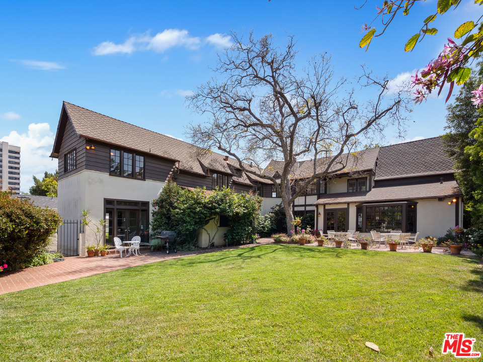 a view of a building with a swimming pool