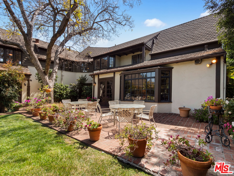 810 Devon Avenue Los Angeles, CA 90024 - Photo 20 of 23 a view of a house with backyard porch and sitting area