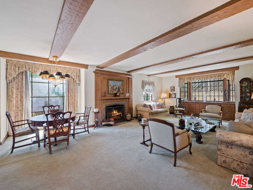 810 Devon Avenue Los Angeles, CA 90024 - Photo 5 of 23 a living room with furniture and a fireplace