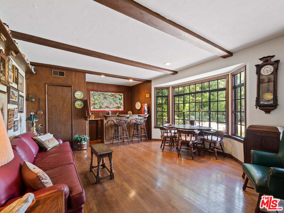 810 Devon Avenue Los Angeles, CA 90024 - Photo 8 of 23 a living room with furniture and a large window