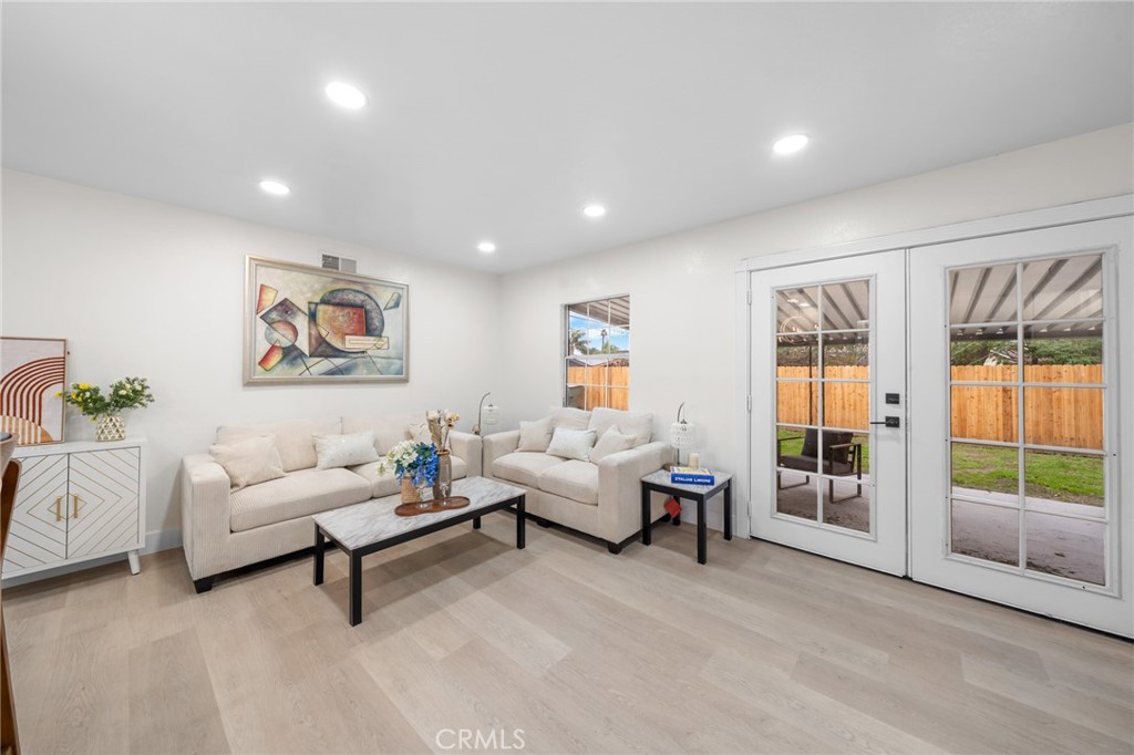 2717 West 6th Street Rialto, CA 92376 - Photo 21 of 30 a living room with furniture and a large window