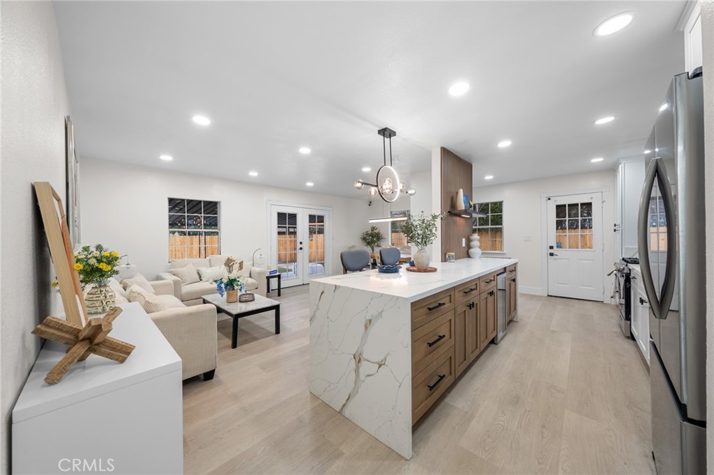 2717 West 6th Street Rialto, CA 92376 - Photo 4 of 30 a large white kitchen with lots of counter top space