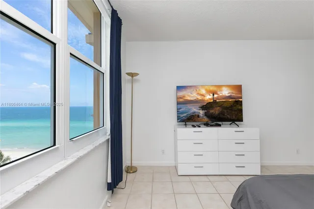 a living room with flat screen tv