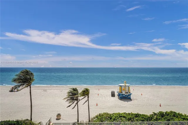a view of beach and ocean