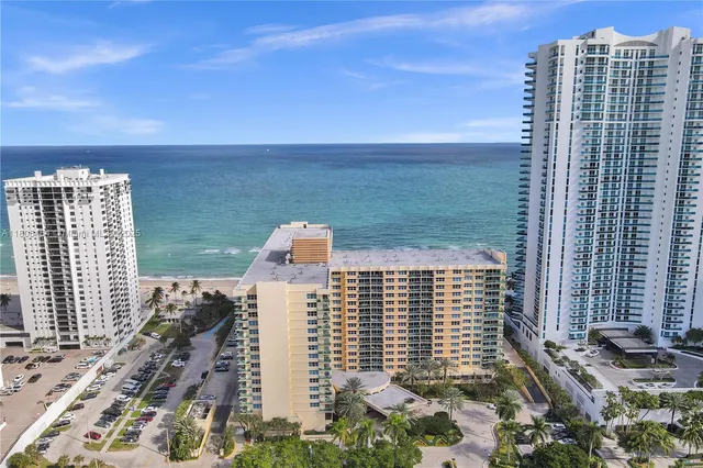 a view of city with tall buildings