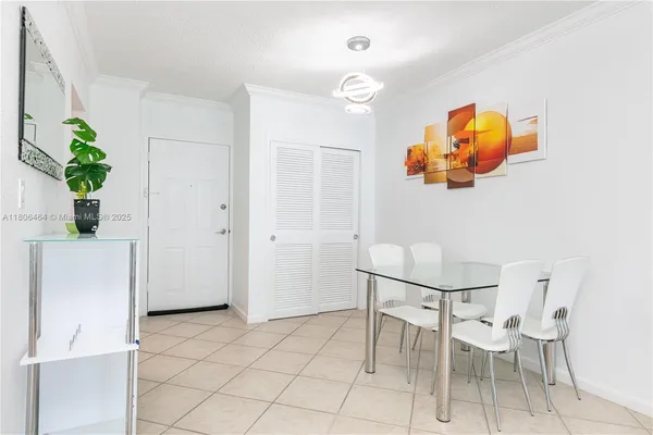 a view of kitchen with furniture and wooden floor
