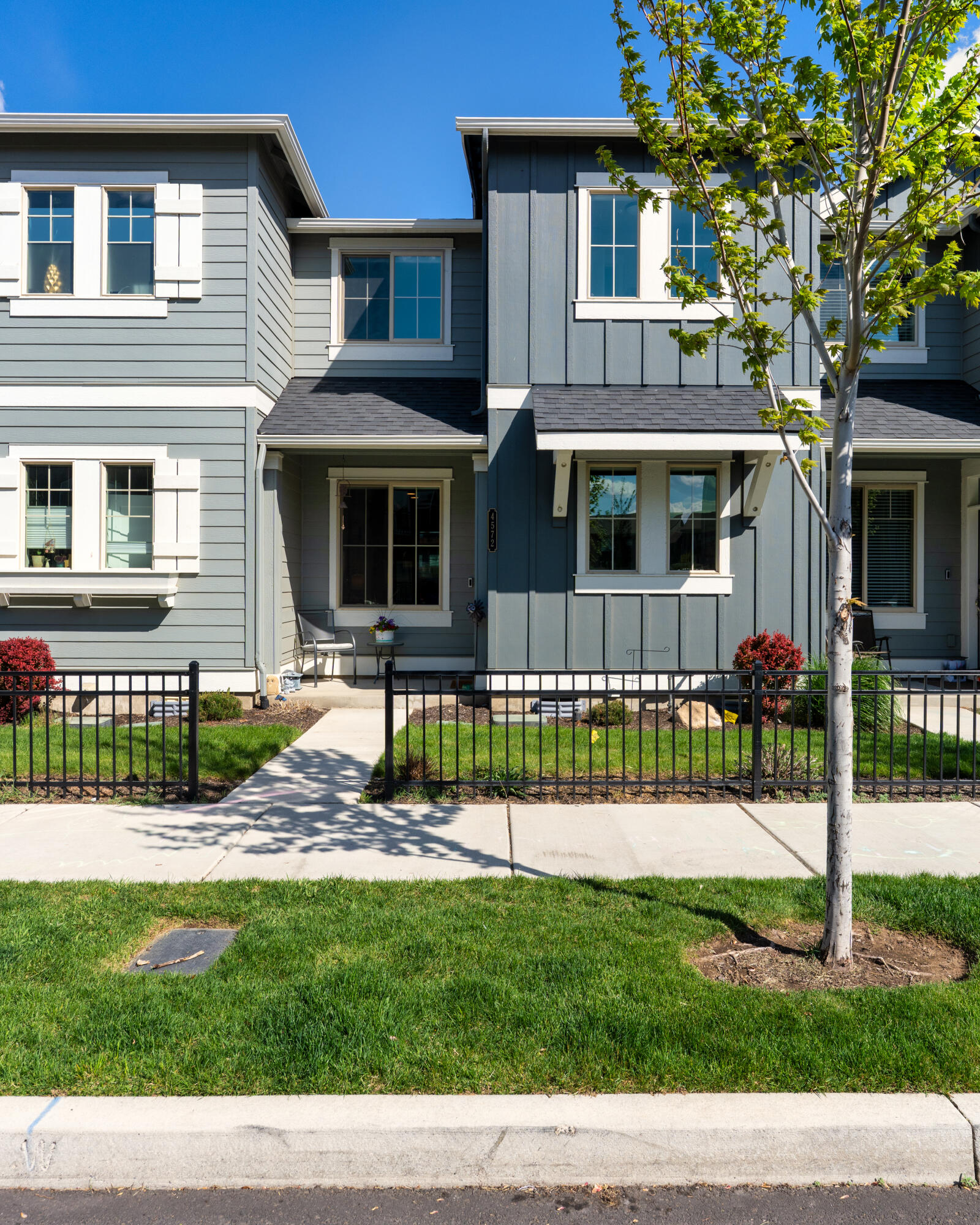 4572 Southwest 37th Street Redmond, OR 97756 - Photo 1 of 19 a front view of a house with a yard