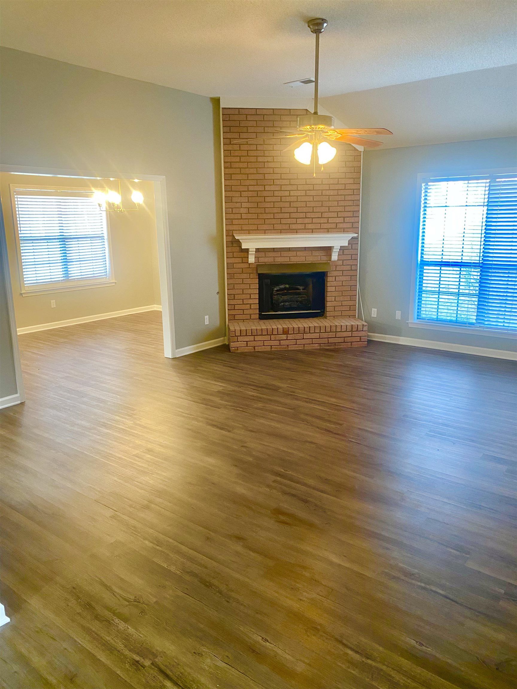 1167 Junco Cove Collierville, TN 38017 - Photo 12 of 25 a view of empty room with wooden floor and fan