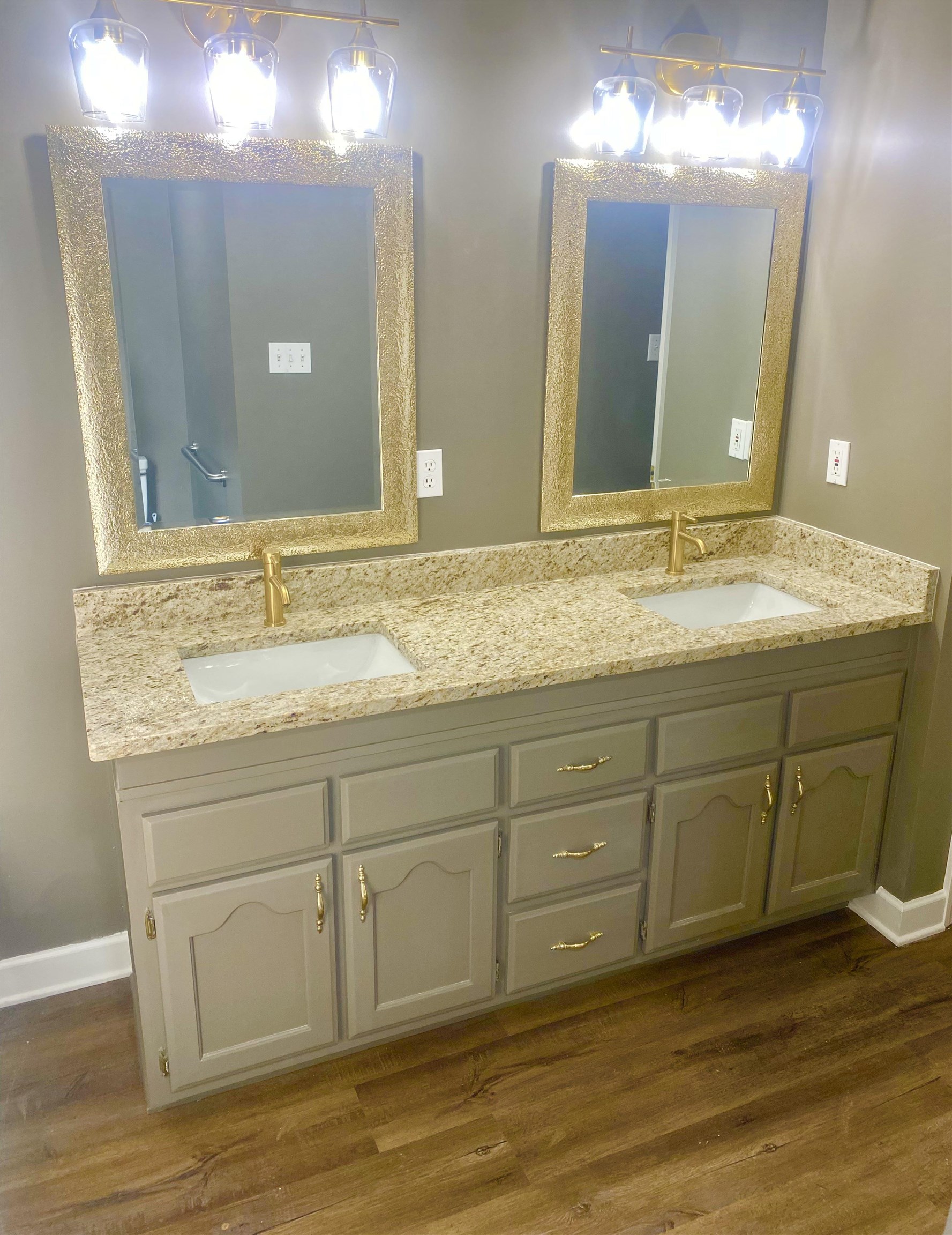 1167 Junco Cove Collierville, TN 38017 - Photo 17 of 25 a bathroom with a granite countertop sink and a mirror