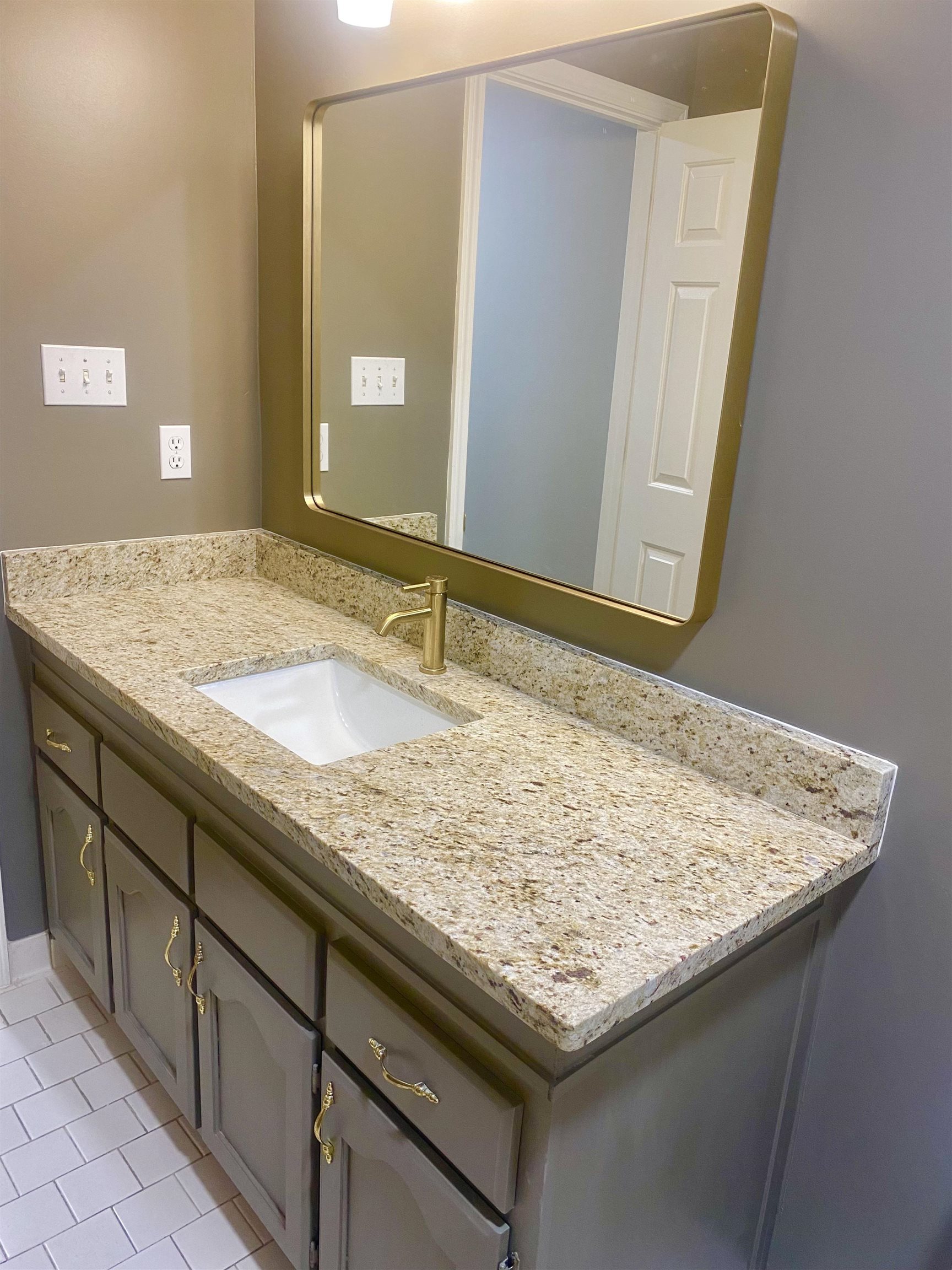 1167 Junco Cove Collierville, TN 38017 - Photo 21 of 25 a bathroom with a granite countertop sink and a mirror
