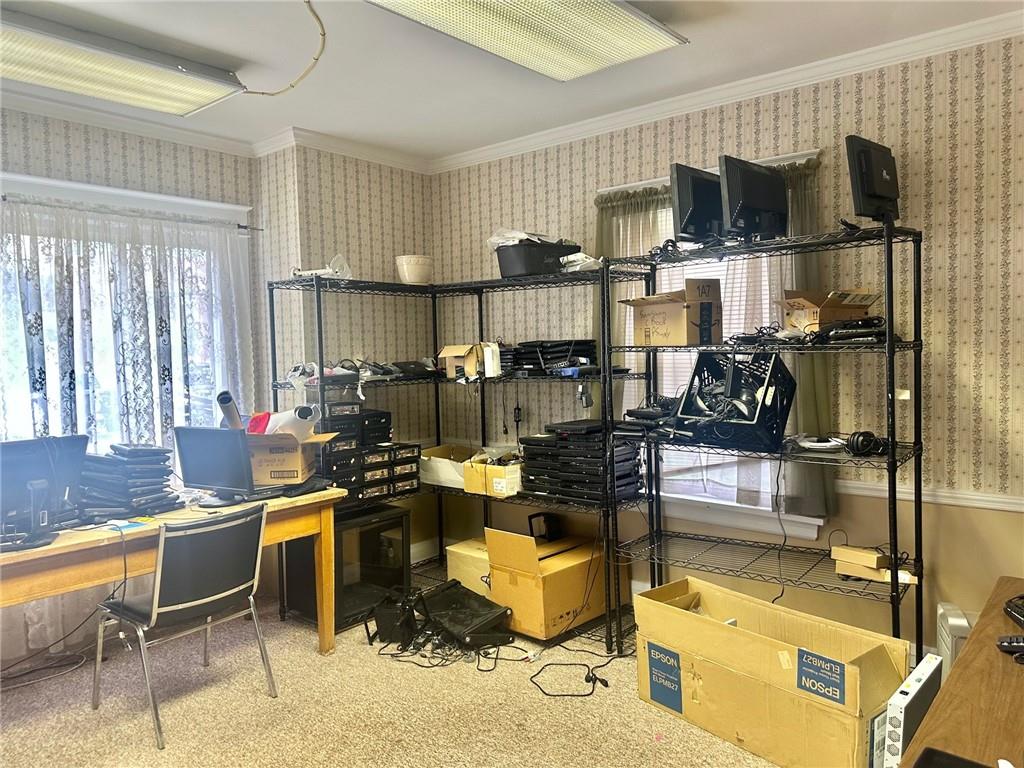 320 Reis Street New Castle, PA 16101 - Photo 11 of 18 a room with gym equipment and window
